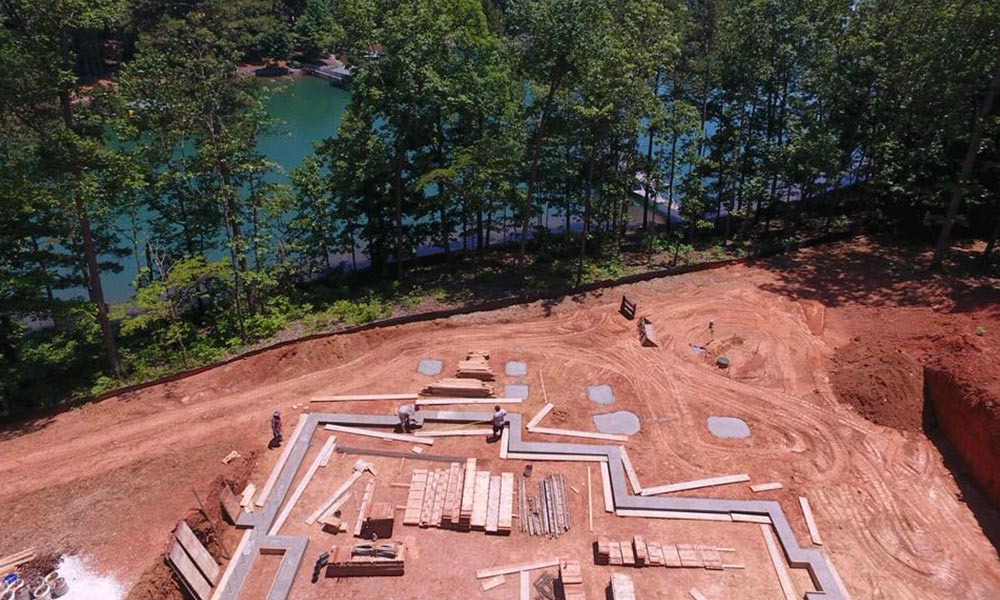 Foundation preparation and waterfront building process by custom home builders in SC